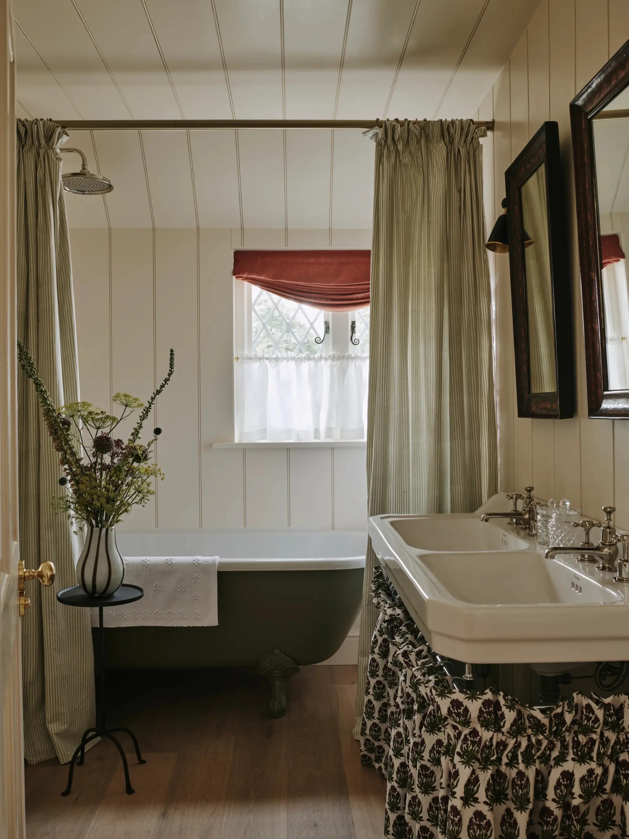 Freestanding bathtub shower by Emma Ainscough